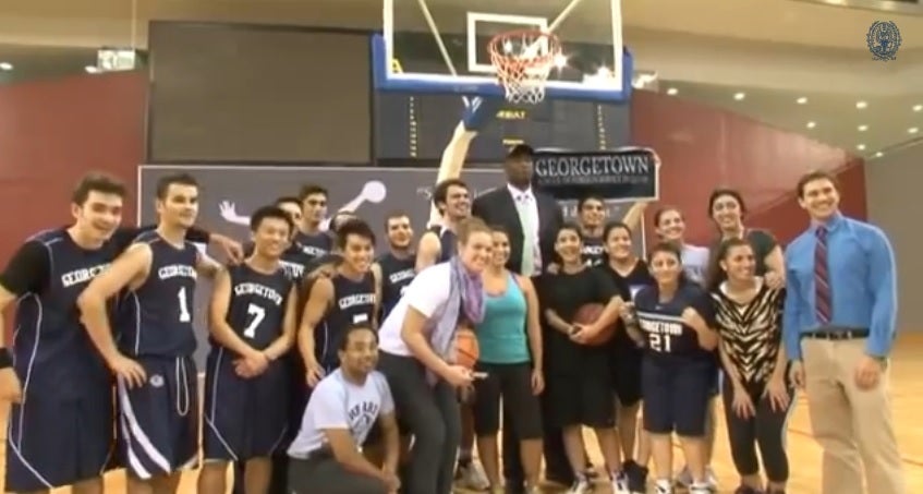 Dikembe Mutombo Visits Georgetown SFS-Q Basketball Teams