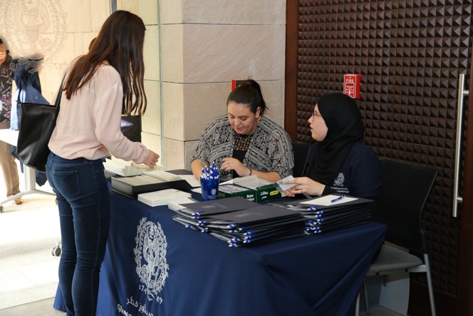 Admissions team with interested students