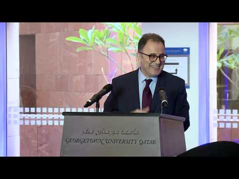 A panel of the Berlin Wall is unveiled at Georgetown University in Qatar