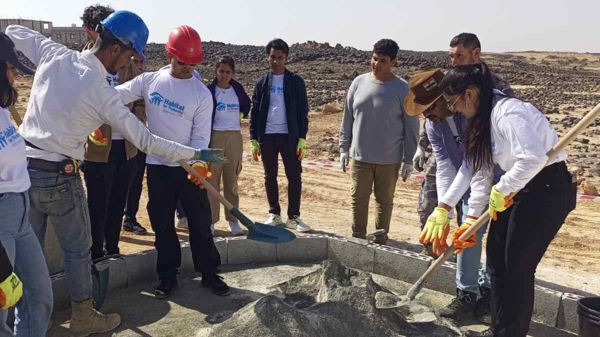 Students working at a construction site for CEP