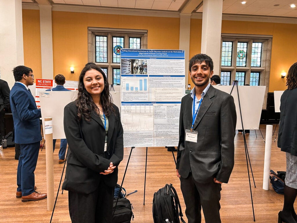 Riwaj and Maheen presenting their work at the National Research Conference held at University of Pennsylvania